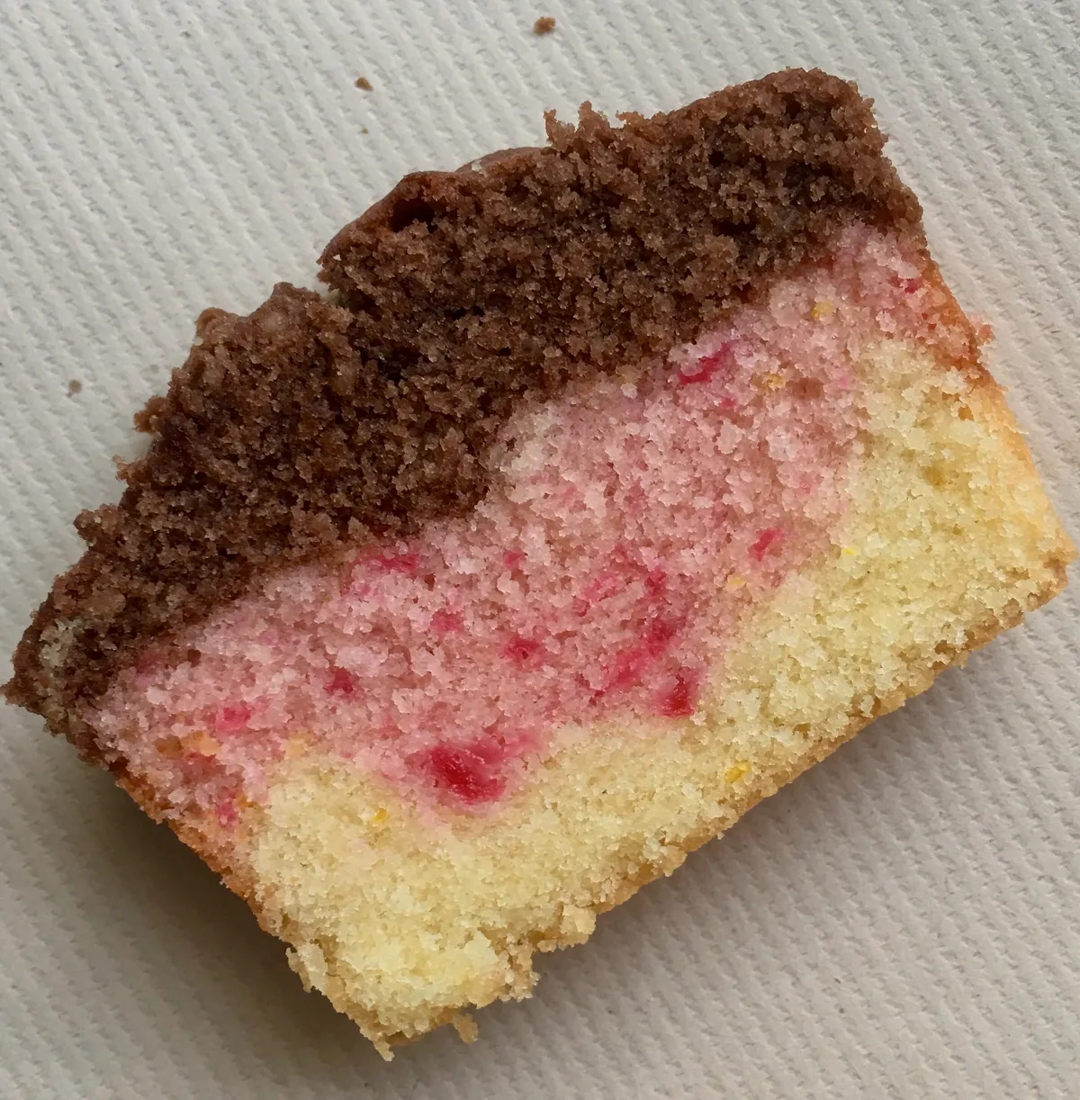 Butter cake flavoured with cream cheese, orange zest,cherry & cocoa..