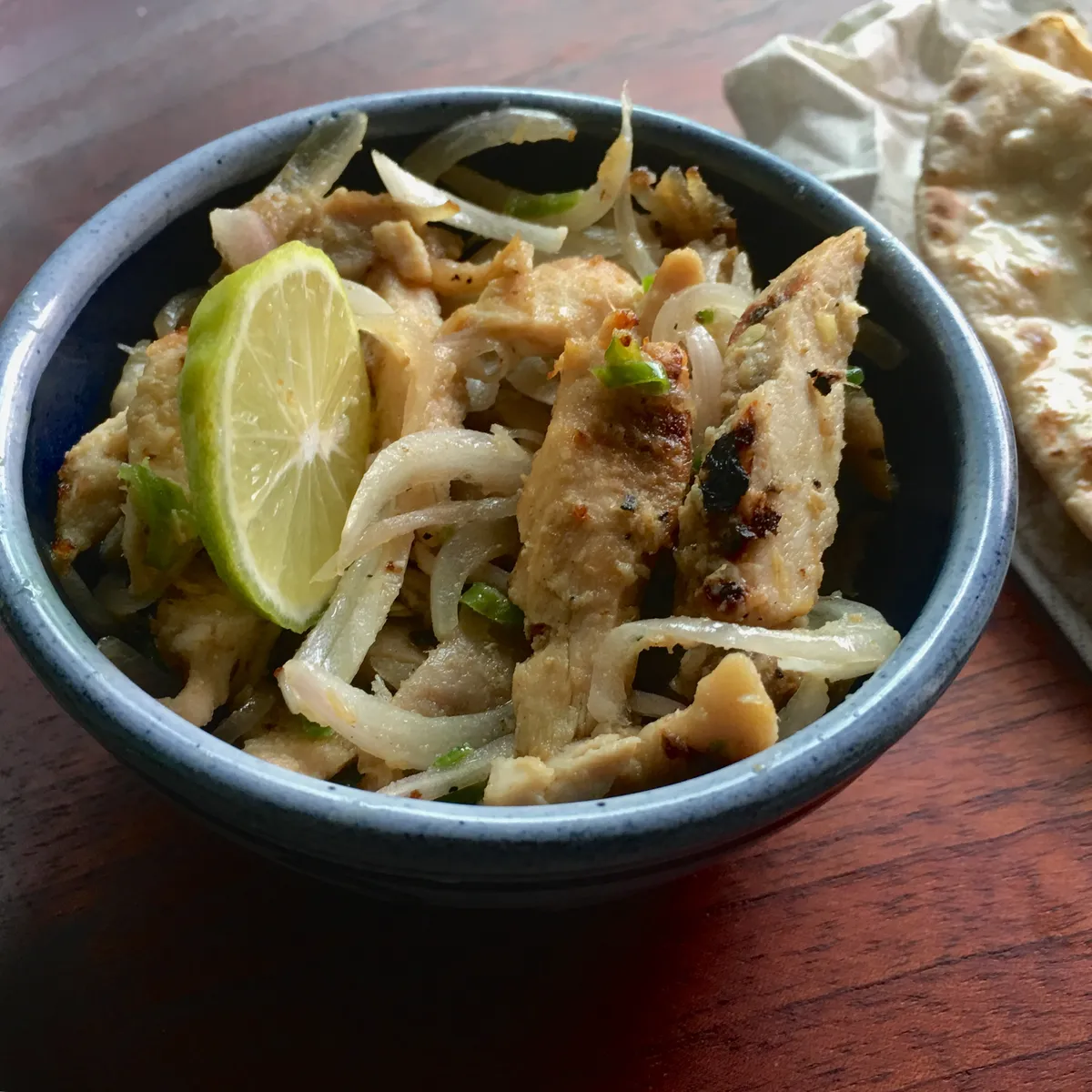 Charcoal grilled chicken salad mildly spiced with garlic ,green chillies ,lemon and chaat masala ..