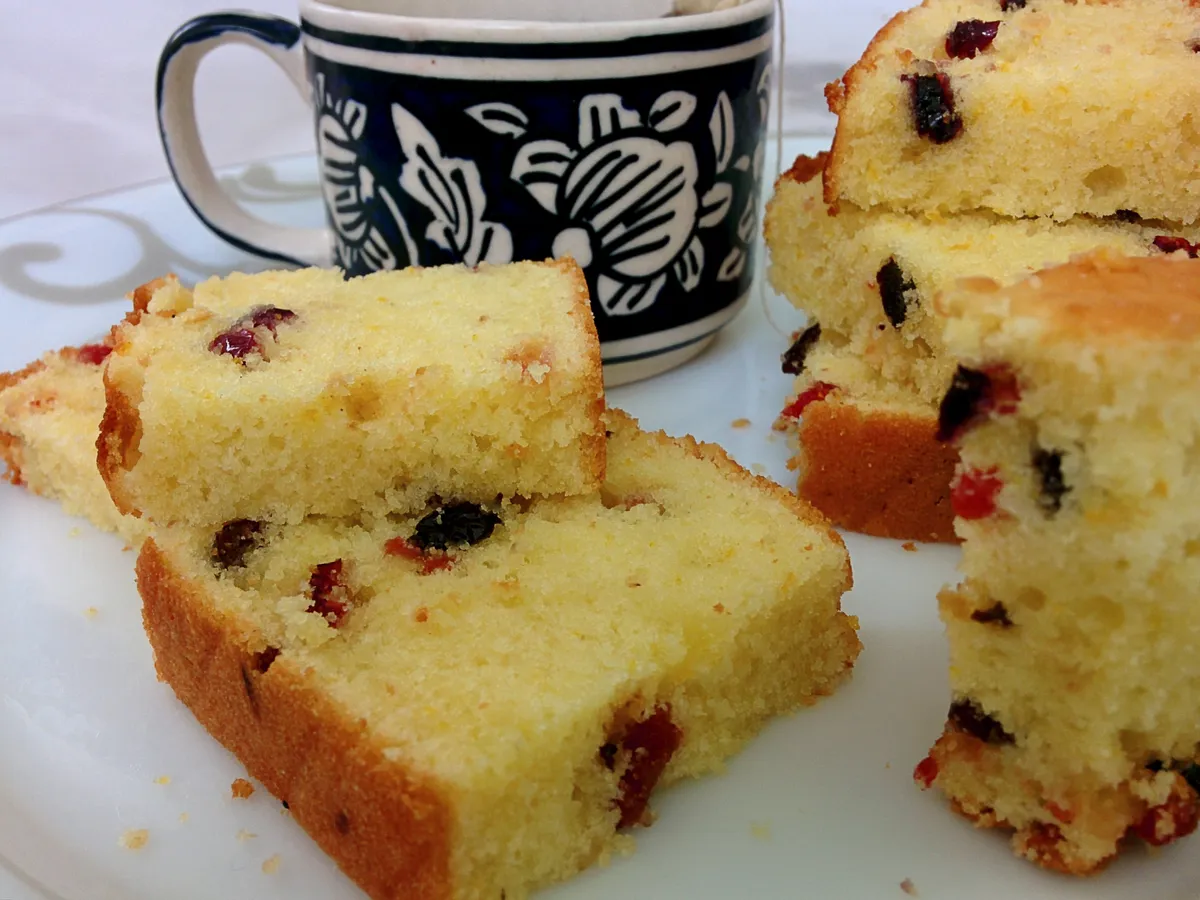 Mixed berry tea cake flavoured with orange zest and orange juice..