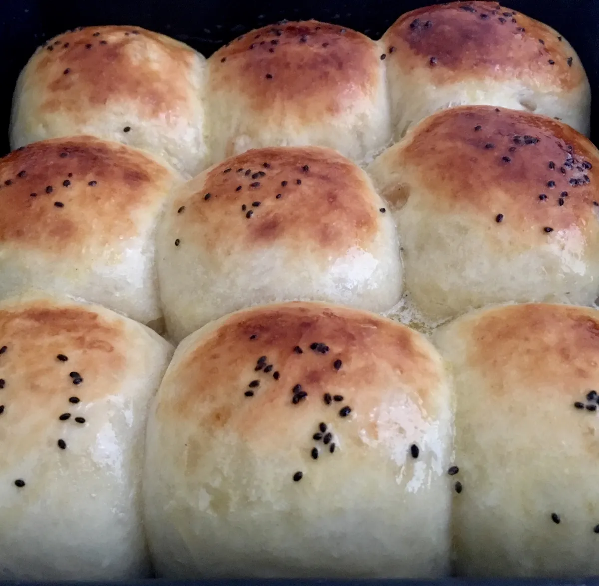 Raisin milk buns flavoured with orange juice..